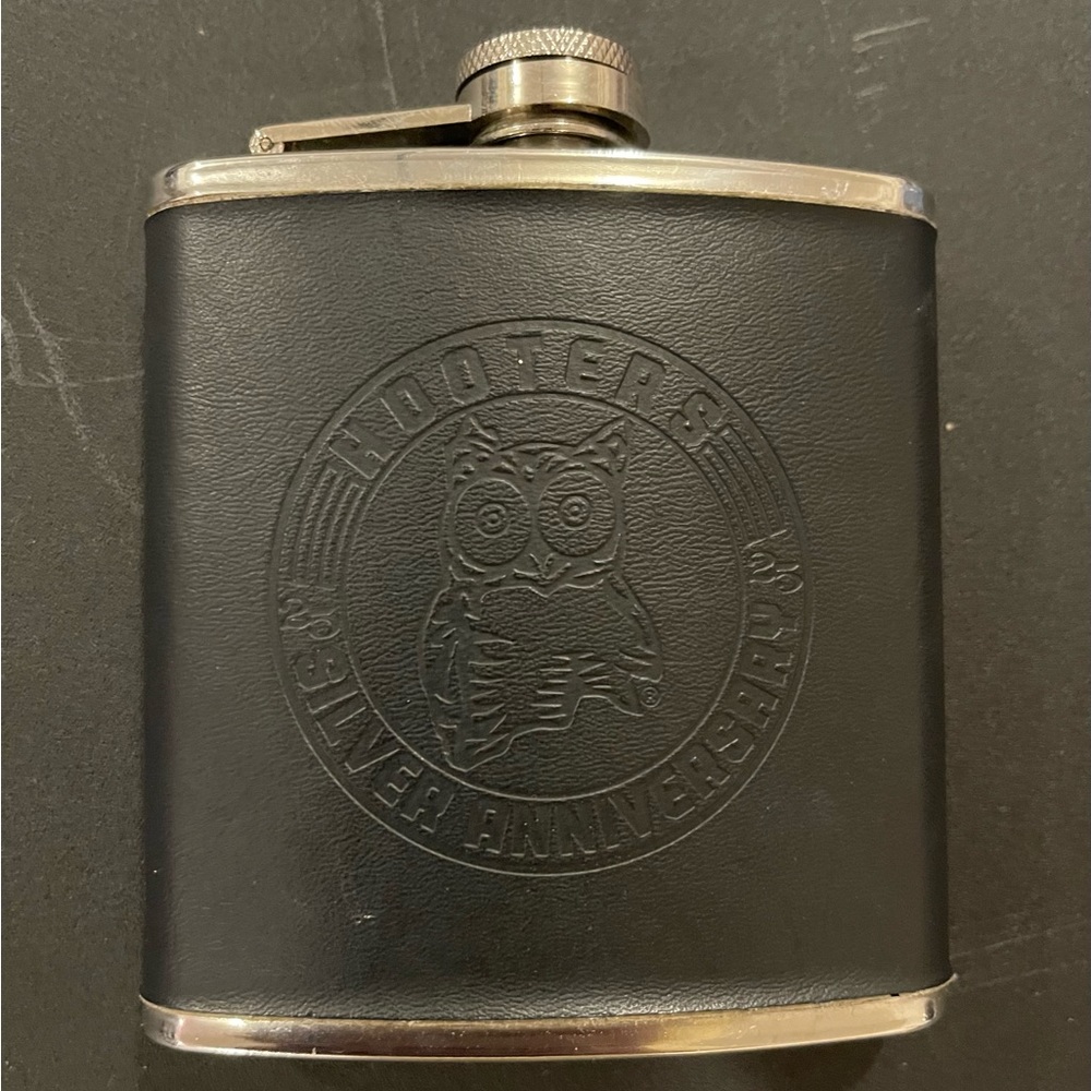 Stainless steel leather wrapped vintage Hooters flask